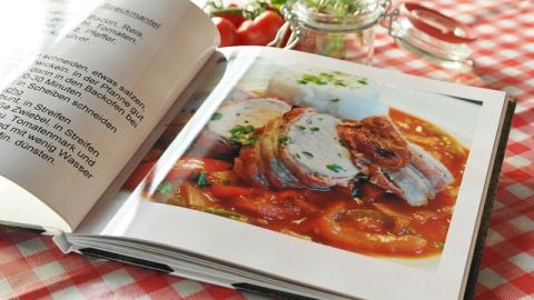 Open cookbook showing a pasta dish