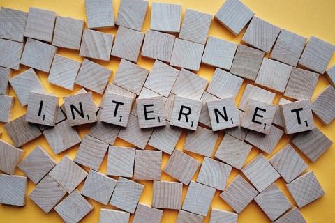 Small wooden tiles spelling out the word internet