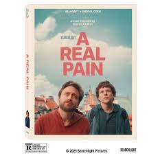 A Real Pain movie poster, two males in hiking clothes looking at the camera