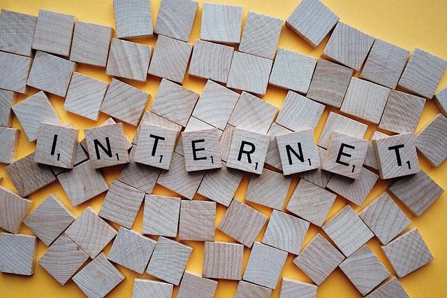 Small wooden tiles spelling out the word internet