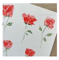 Section of a piece of paper with watercolor roses painted on it